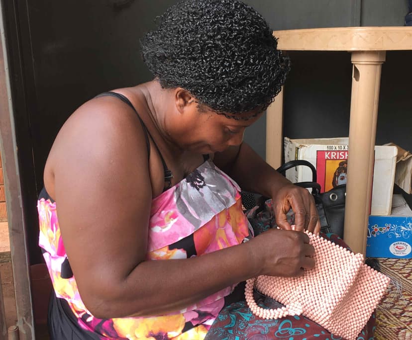 Jalia assembling a dolly bag